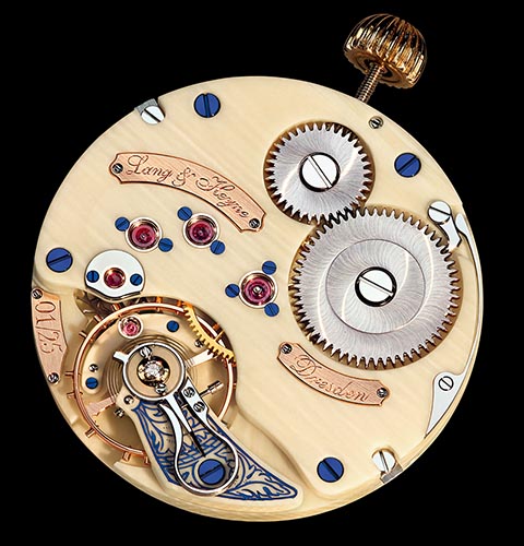 Elegant wristwatch movement, mammoth ivory plate, sunburst finish, blued screws, black polishing.