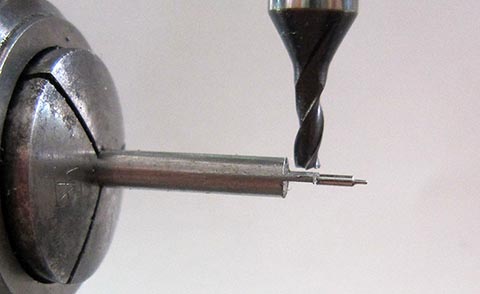 Antique verge escapement table clock with fusee and chain. Manufacturing the long pallet of the balance staff on a milling machine.