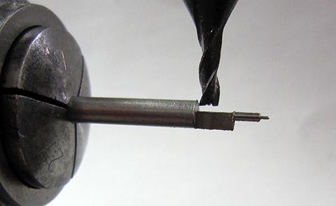 Close-up of crafting the long pallet for the balance staff using a milling machine. Antique fusee-driven table clock.