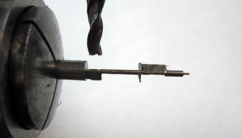 Detail view: Milling the short pallet for the balance staff. Antique fusee-driven table clock.