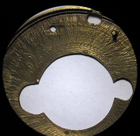 Antique verge escapement table clock with fusee and chain. Detail view of the signature on the dial base.