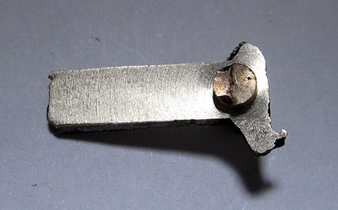 Cylinders machined on both sides at one end of the blank. Top view. Antique fusee bracket clock. Manufacturing the hour hand.