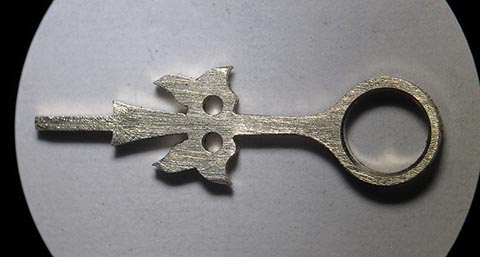 Antique fusee bracket clock. Drilled hole Ø 3.2 mm and shaped leaves of the gold hour hand.