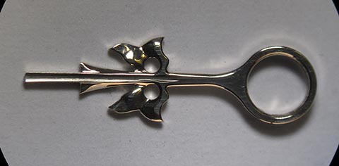 Antique bracket clock with verge escapement, fusee, and chain. Engraved and polished relief of the gold hour hand.