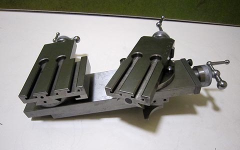 Double carriage cross slide for the Schaublin 70 lathe featuring two transverse slides. Side view.