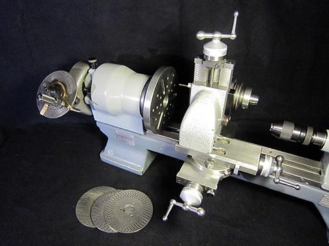 Schaublin 70 lathe, vertical slide, indexing attachment with four division discs, faceplate Ø 138 mm.