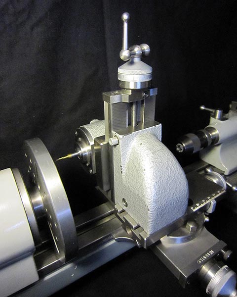 Schaublin 70 lathe, vertical slide, faceplate mounted on the spindle.